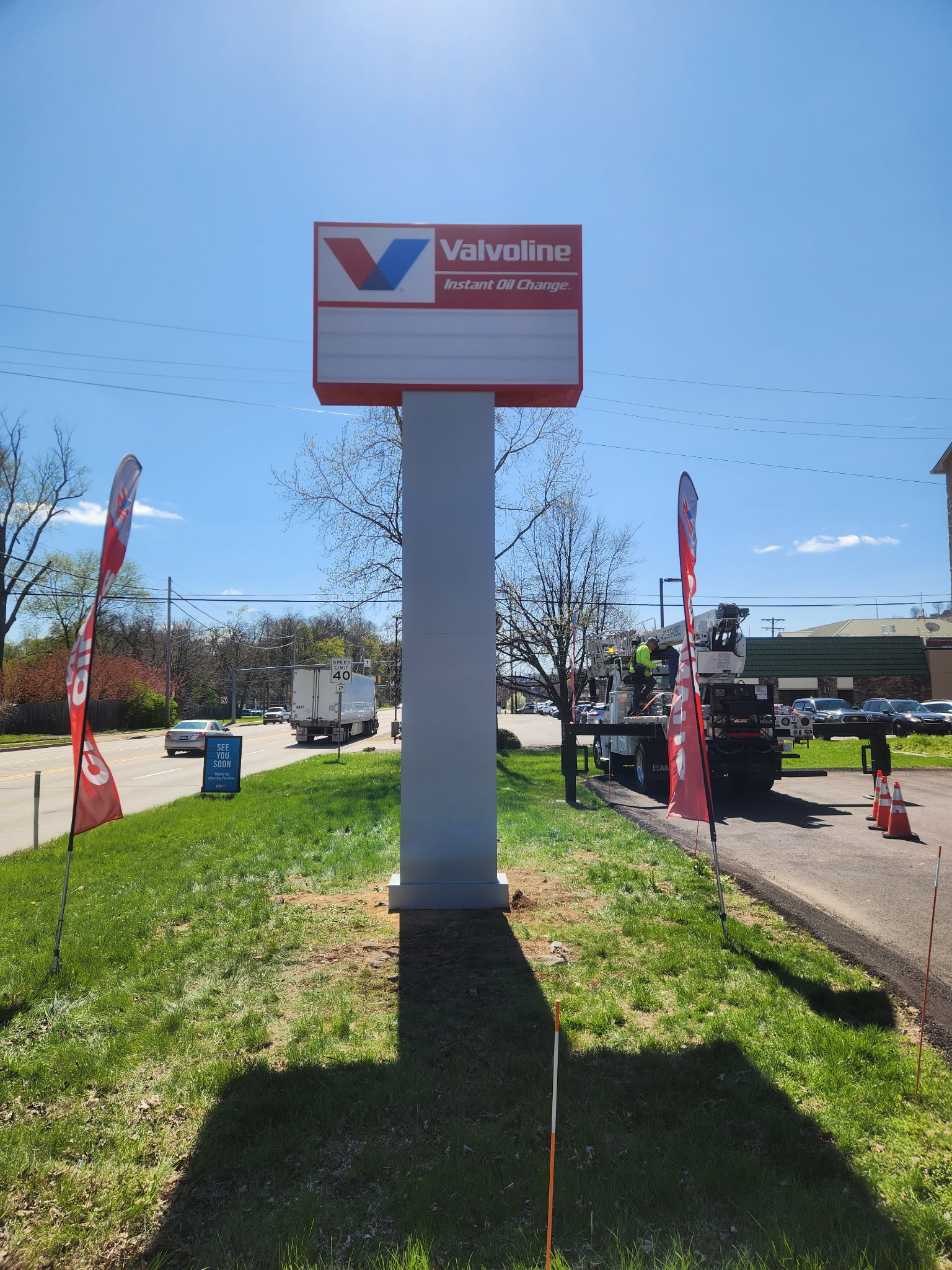 Valvoline sign installation